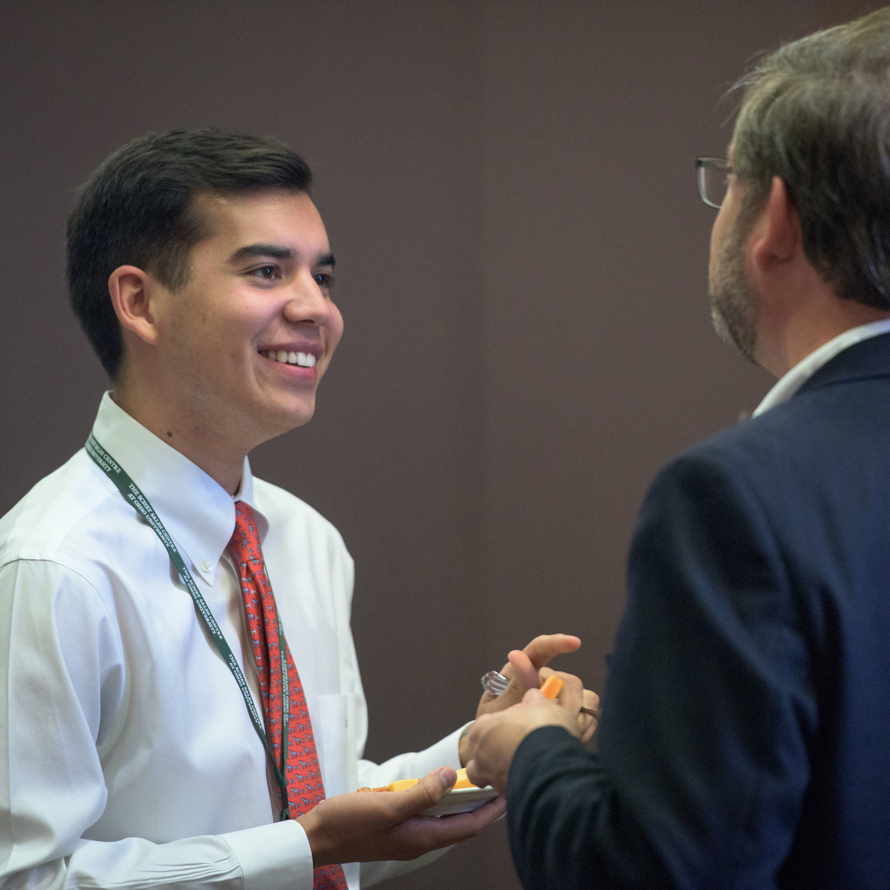 Two participants at an Executive Education workshop in the College of Business