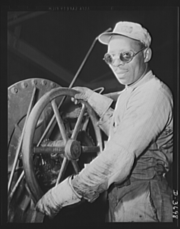 Black and white photo of man at work