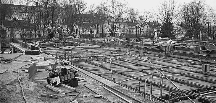 Building starting to be built with ground plans laid out.