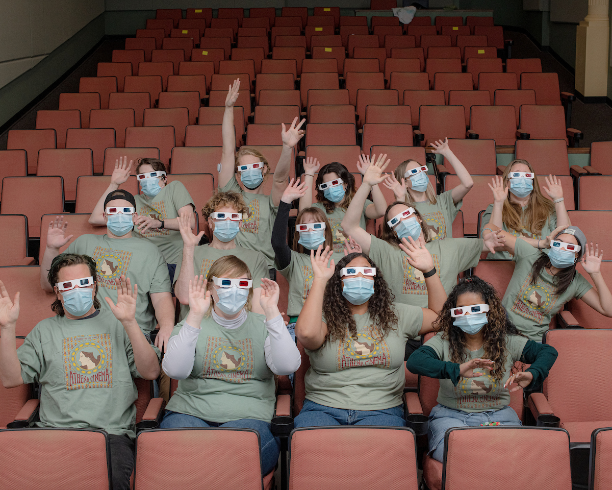 Athena Cinema staff seated in theater with 3D glasses