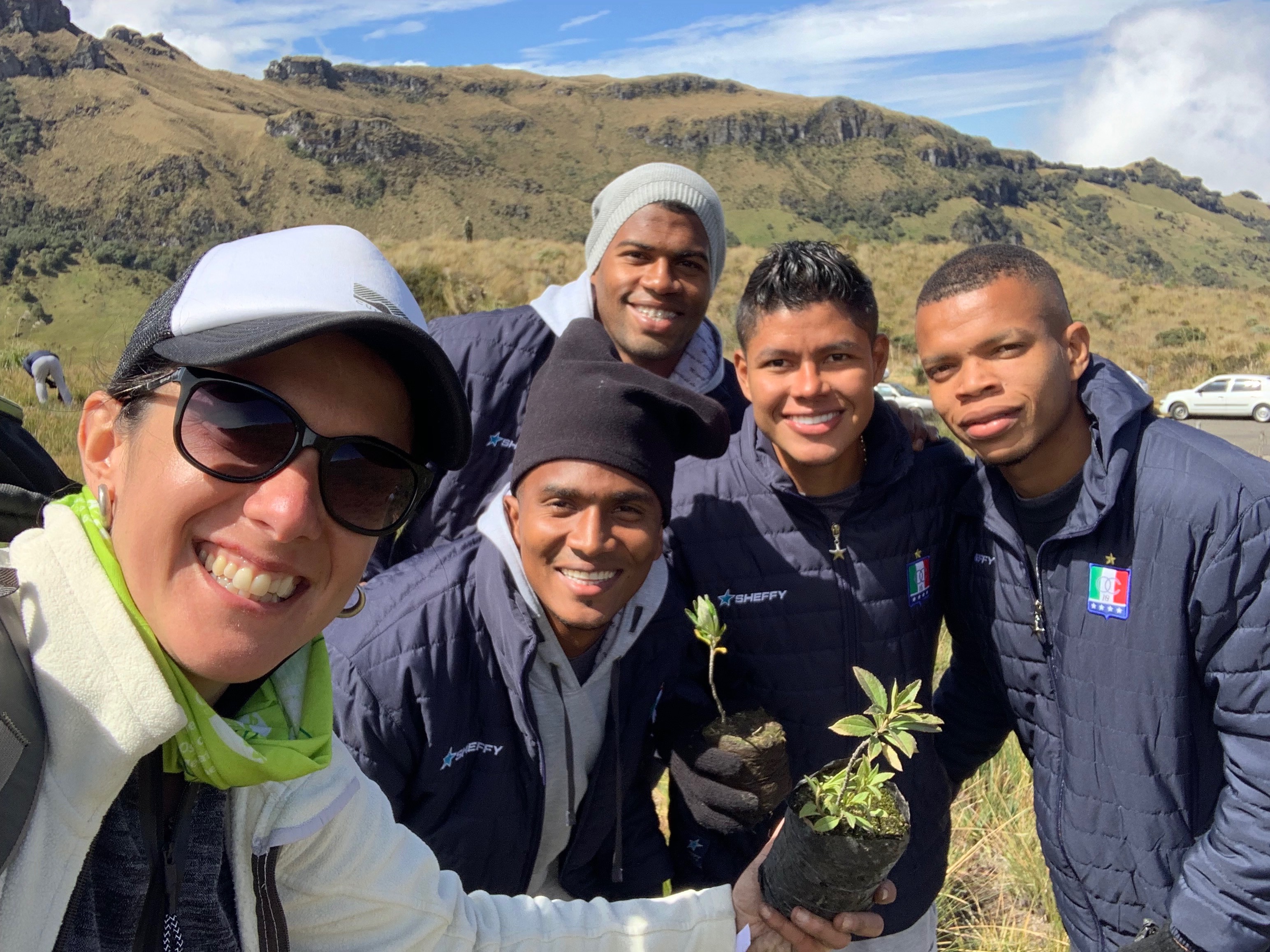 Members of the Colombian national soccer team helped the research team plant trees in Colombia.