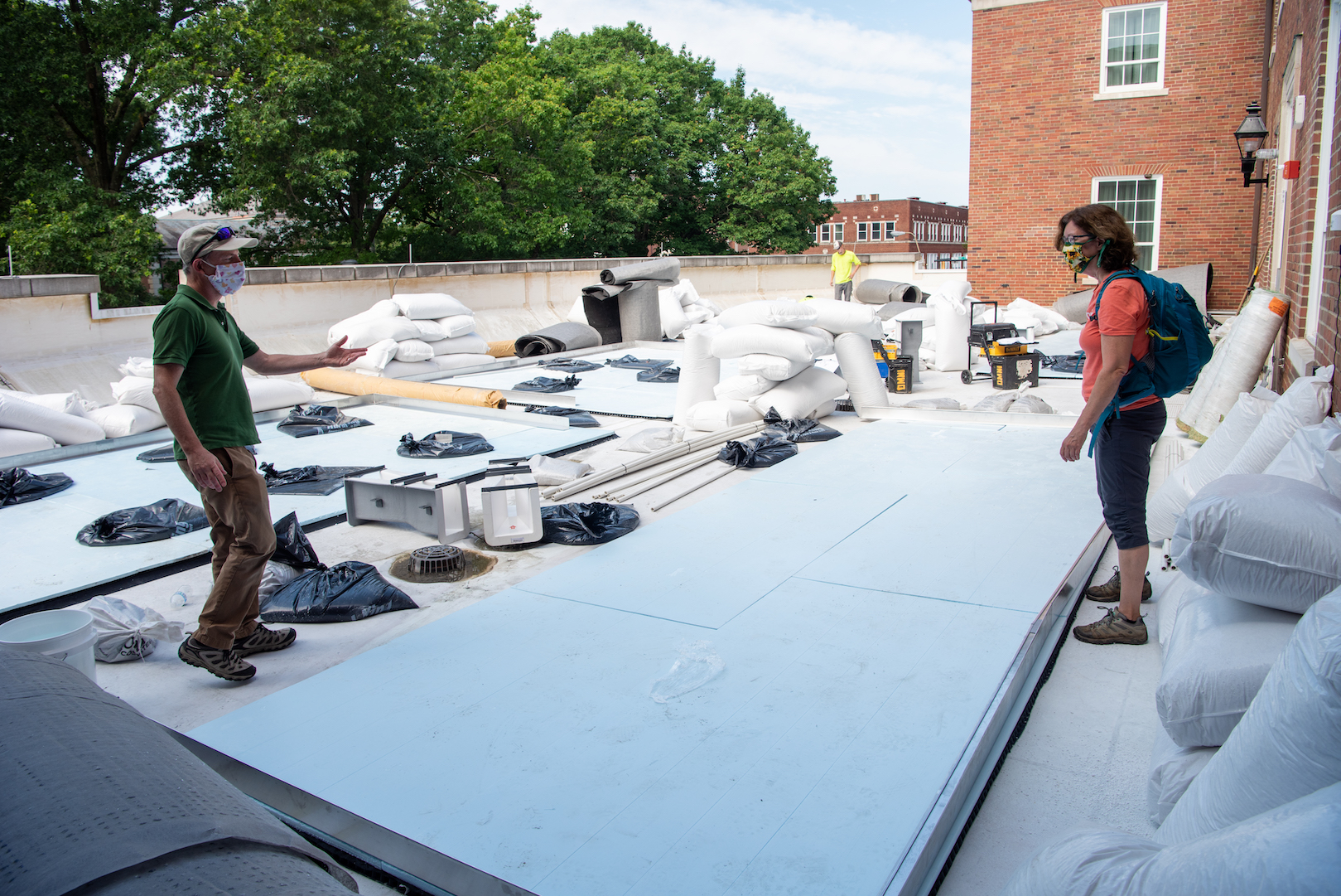 Drs. Rosenthal and Thompson overseeing construction on the new green roof