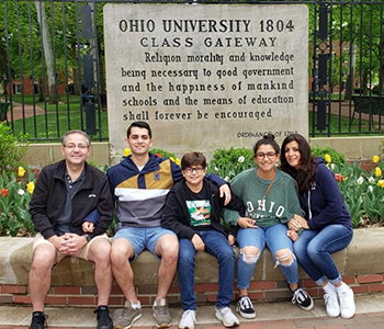 The Afyouni family poses in front of Ohio University’s iconic Class Gateway.