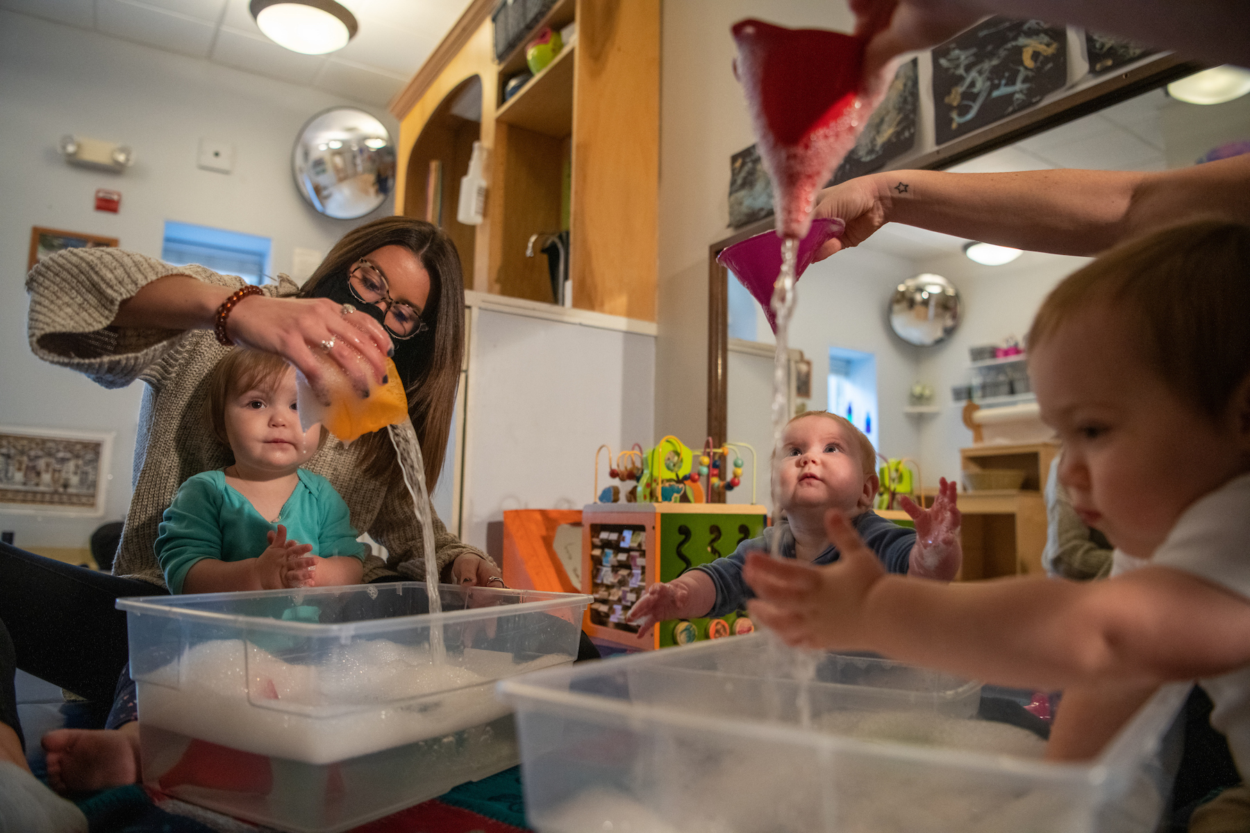 Teacher education student working with infants