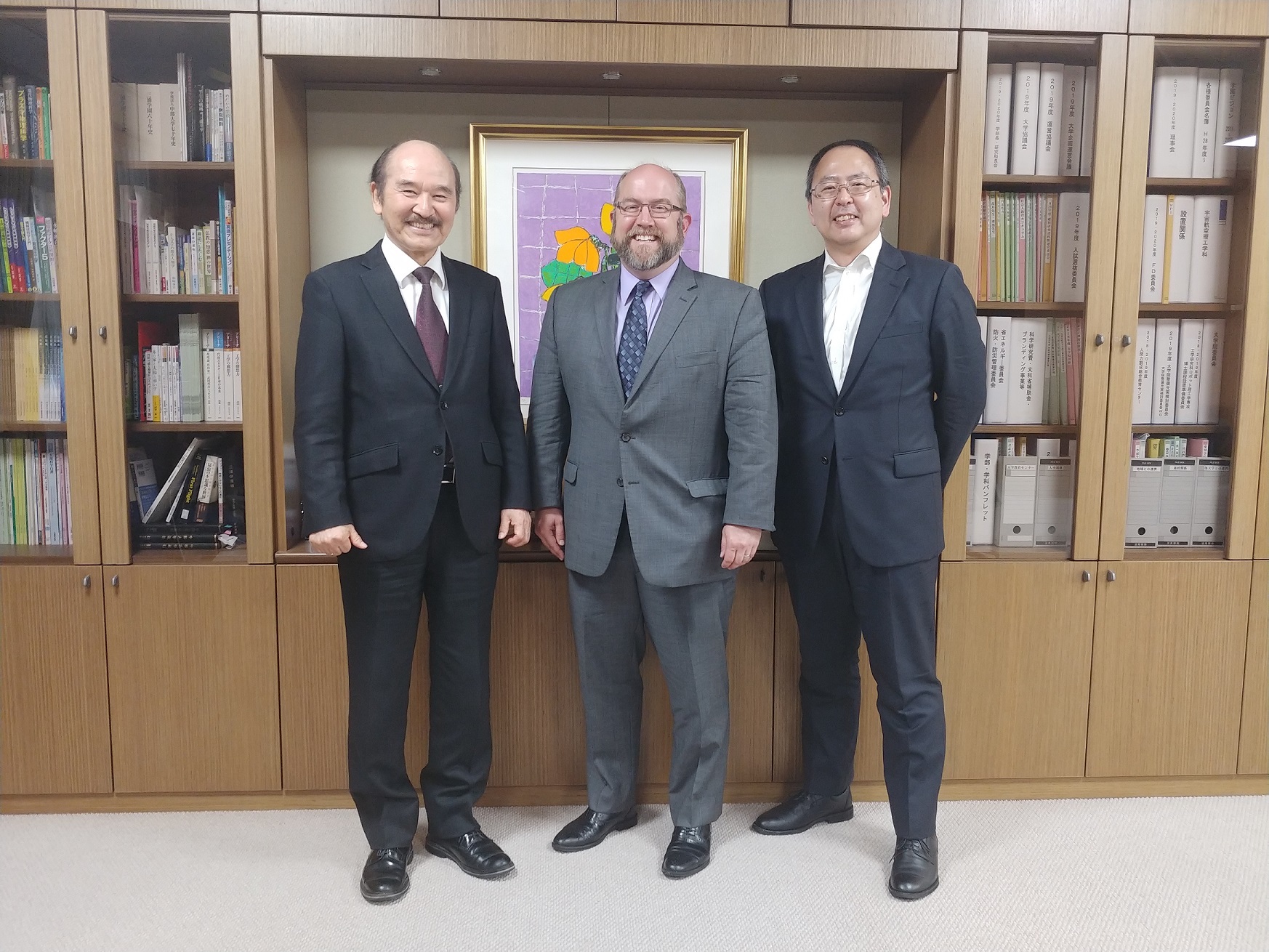 From Left: Chubu President Osamu Ishihara, Professor Bejamin Bates, and Professor Tomohiro Yanagi, Chubu Professor of English and 2018 Glidden Visiting Professor.