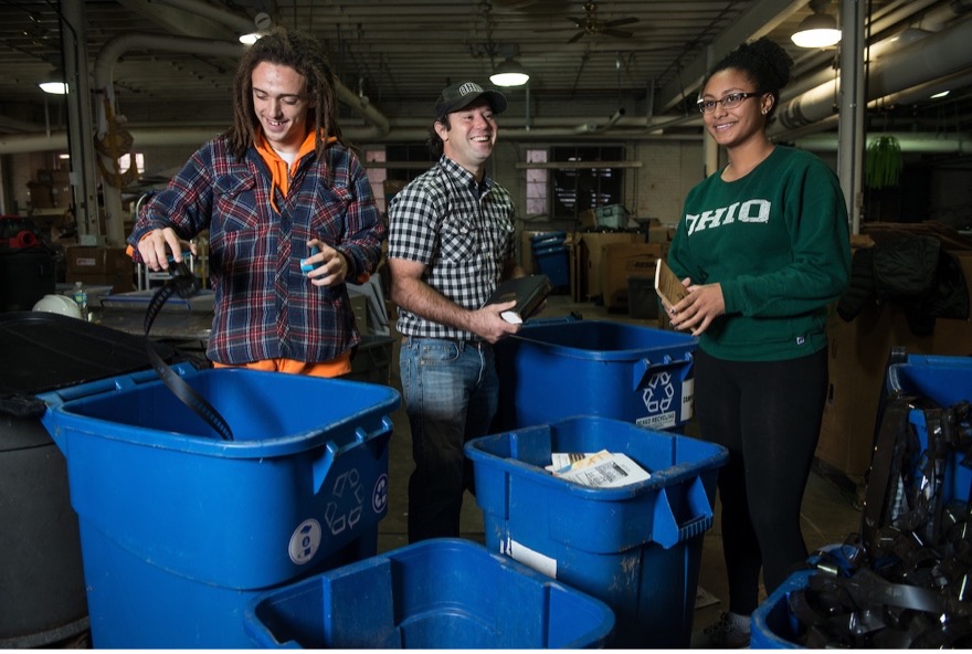 Ohio University students help to sort recycling alongside Athens community partners.