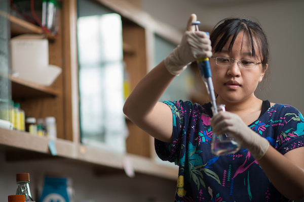 A woman works in the lab