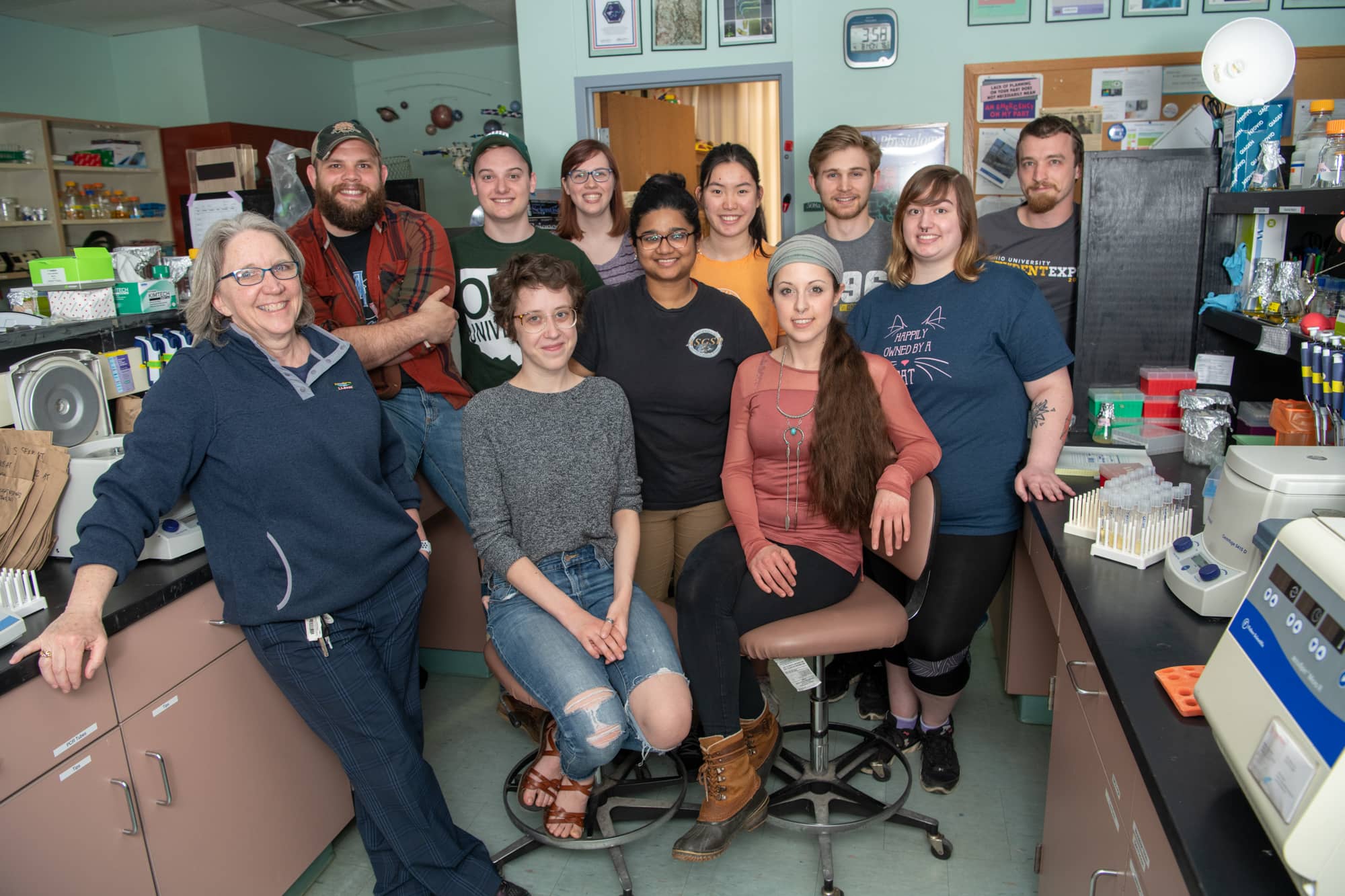 Sarah Wyatt, Ph.D., left, is photographed with her team in her lab at Porter Hall.