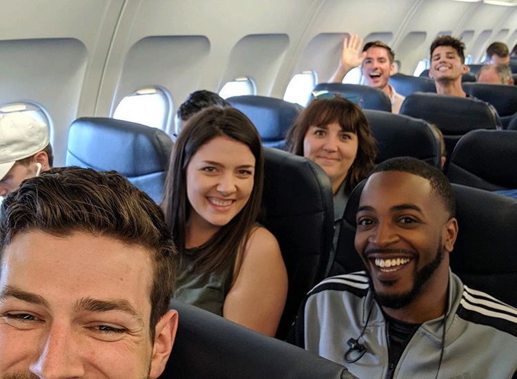 Kasey Daniel and Russell Morrow are photographed on a plane with some of their fellow Bobcat Student Orientation leaders during a group reunion.