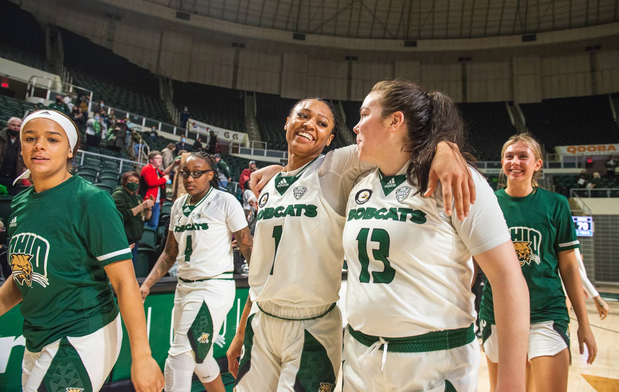 “I play a big part of this team and I know that they need me to have good spirits all the time, so I try to stay as positive as I can.” Hooks embraces teammate Kaylee Bambule after a home win.