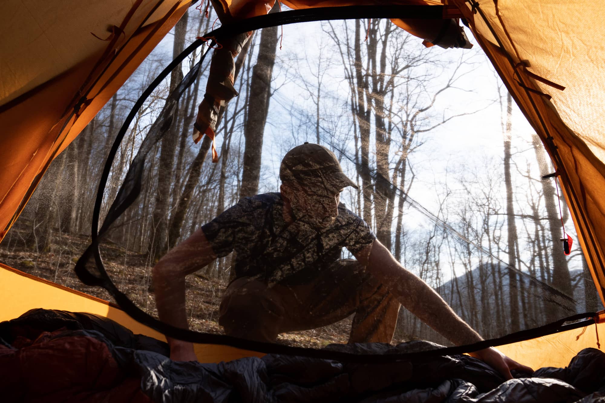 Eamonn Bell hike lays his sleeping bag in our tent during his first night backpacking a section of the Appalachian Trail in the Nantahala National Forest on Saturday, March 5, 2022, at the Rock Gap campground near Franklin, North Carolina.