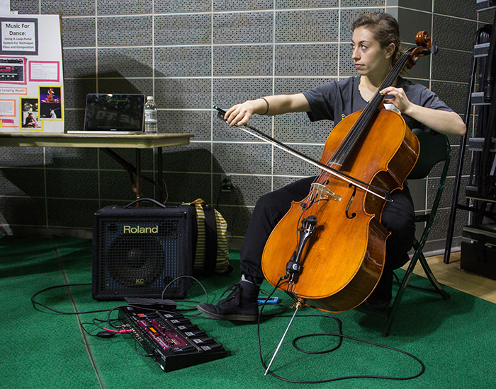 Lily Gelfand, BFA ’18, demonstrates how to use a looper pedal system at Ohio University’s 2016 Student Expo.