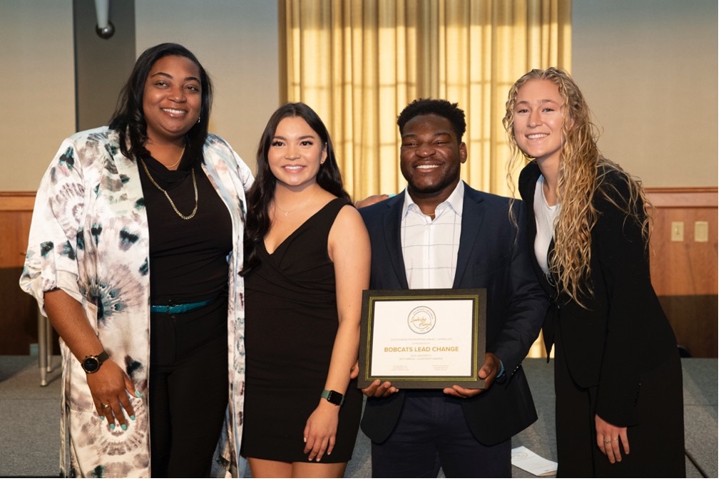 Representatives from the student organization Bobcats Lead Change accepted the Outstanding Programming Award for their program, “Bridging the Gap.”