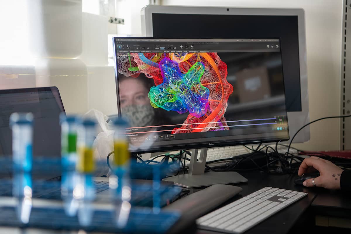 Student looking at a molecular science model on a computer screen