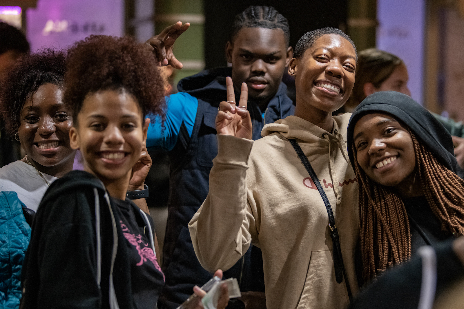 Students arrive at the Athena Cinema for a screening of Black Panther: Wakanda Forever.