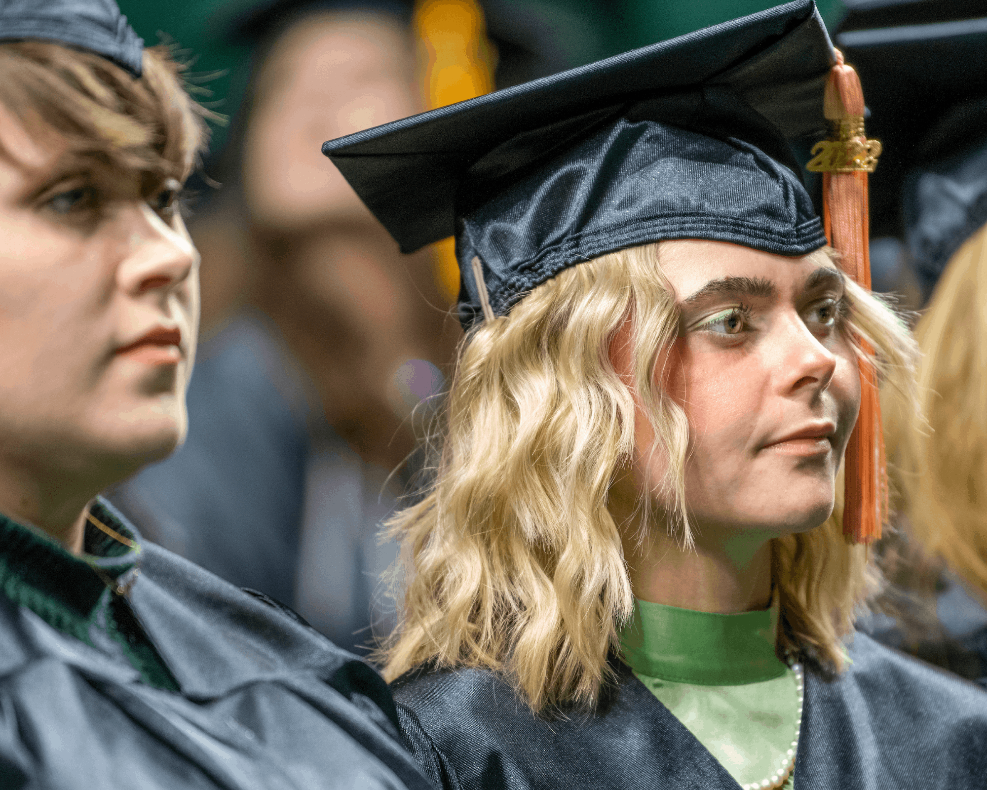 Graduates listen to the commencement address at Fall Commencement.