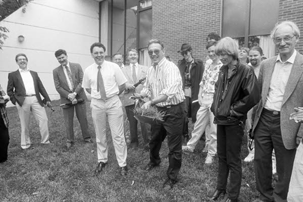 Ground breaking for the expansion of the John E. Edwards Accelerator Laboratory in 1993. People visible from left to right include Louis Wright, Lloyd Chestnut, David Ingram, Jacobo Rapaport, David Onley, Roger Finlay (with shovel), Jim Dilley, Charlotte Elster, and Chuck Brient.