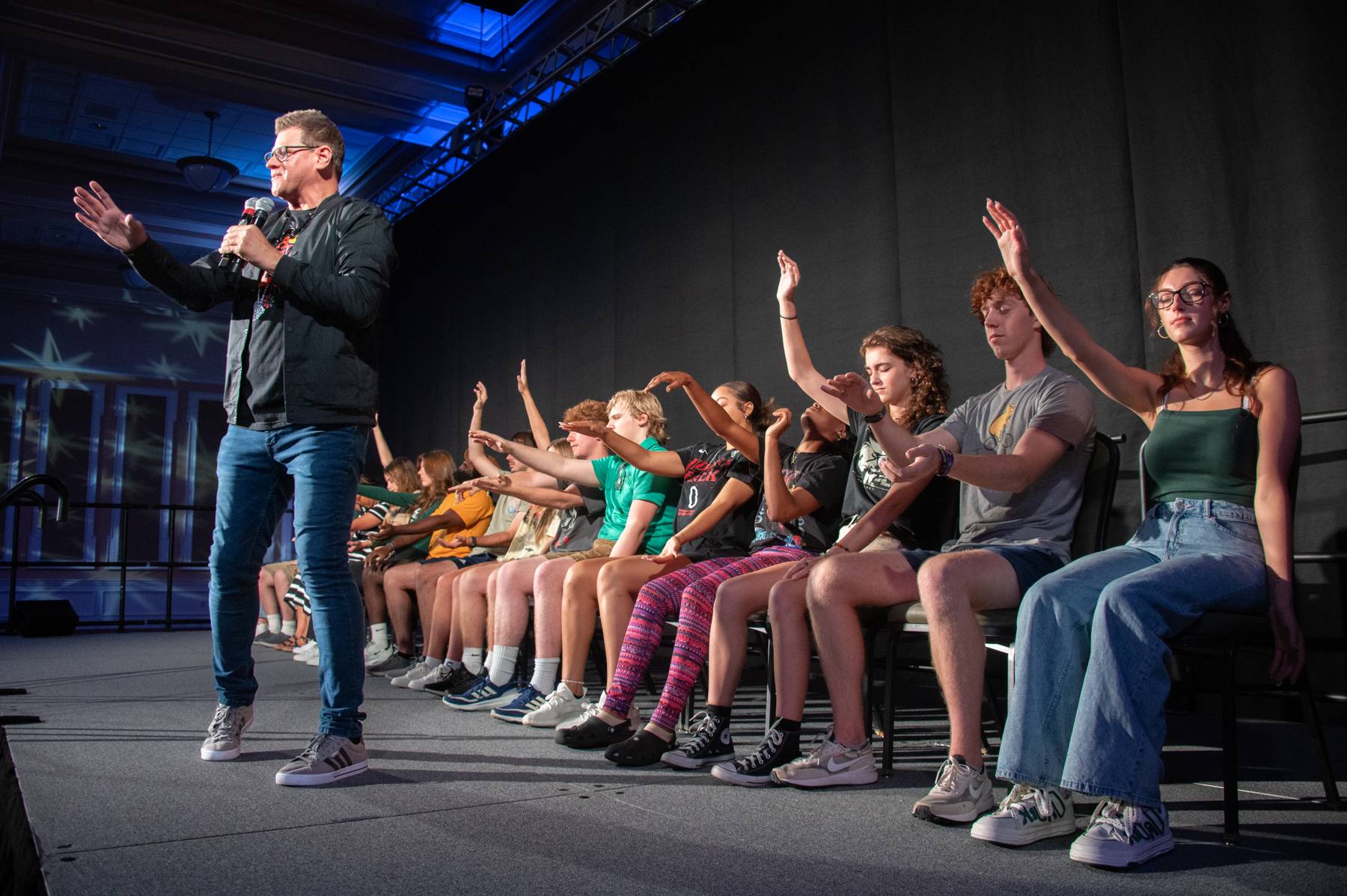 A hypnotist performs at Baker Center for Welcome Week.