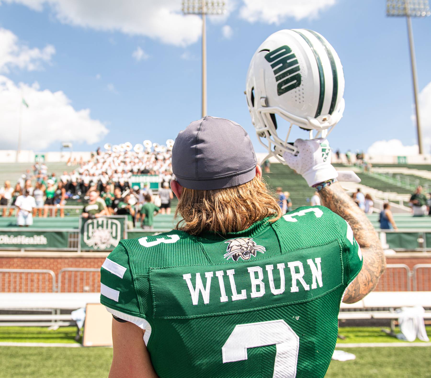 OHIO football player Keegan Wilbur cheers his team during their first home game of the year. 