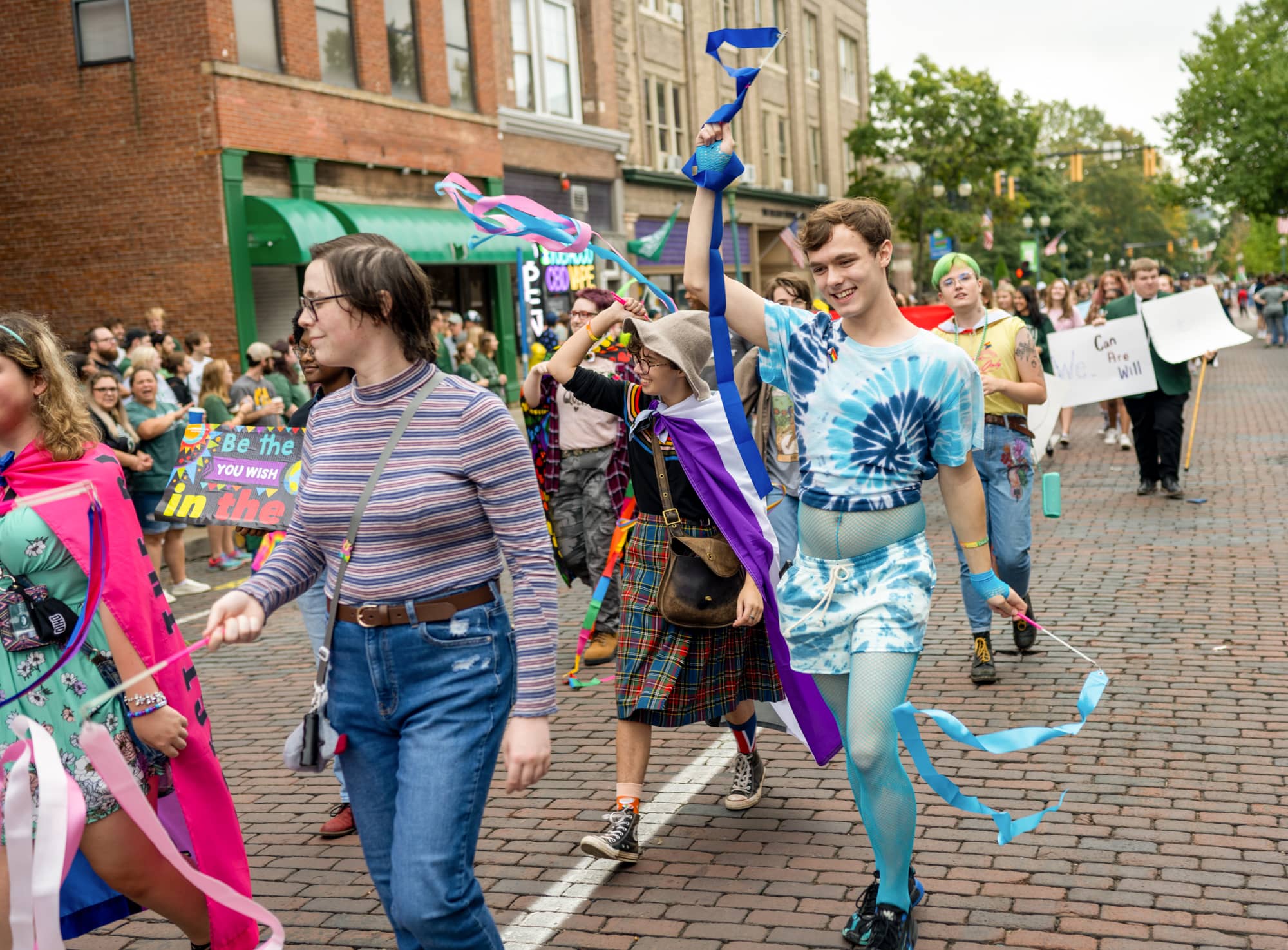 Students from the LGTBQ Center participate in the Homecoming Parade.