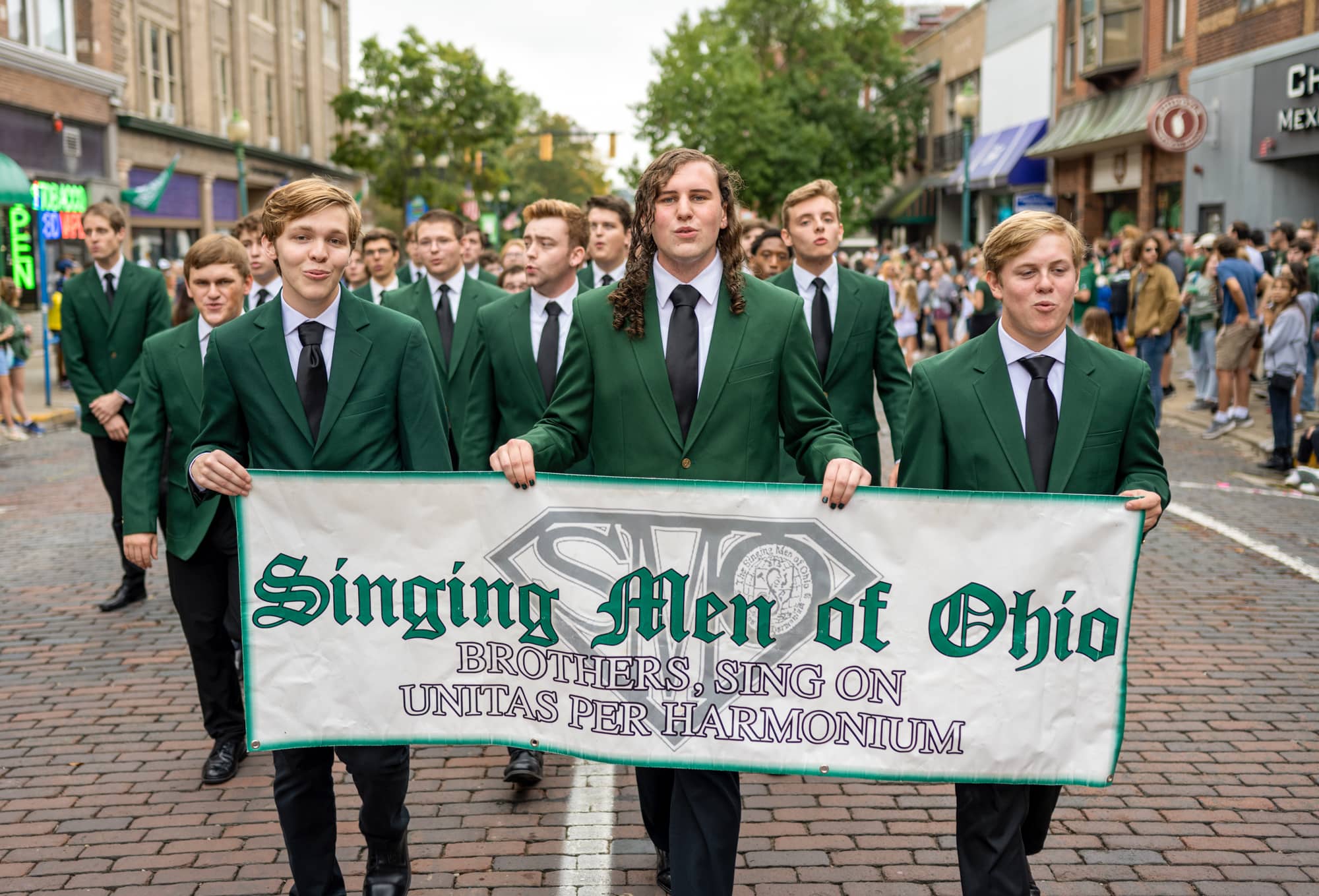 Members of the Singing Men of Ohio participate in the Homecoming Parade. 