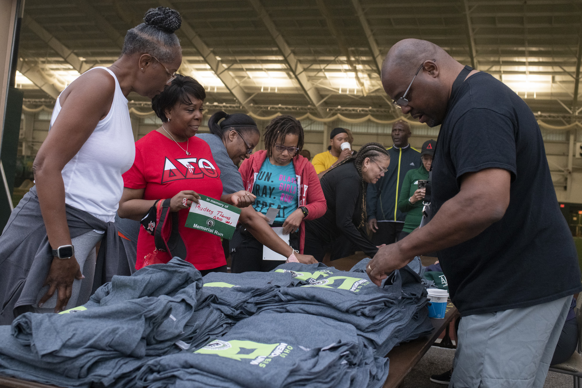 BAR Memorial Run/Walk participants pick up their event T-shirts and stickers that allowed them to display the loved one or ones they were running or walking in memory of.