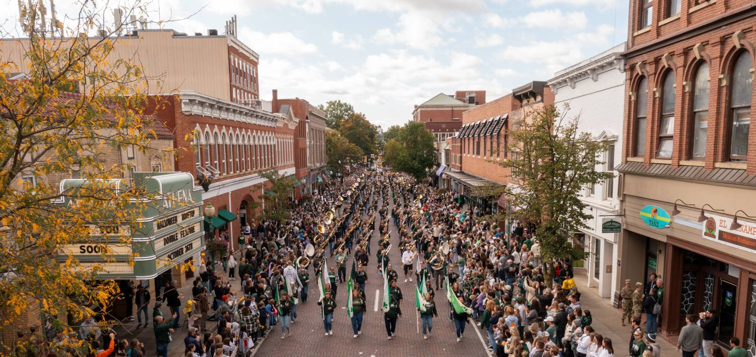 The Marching 110 Alumni Band marches down Court Street during the Homecoming Parade.