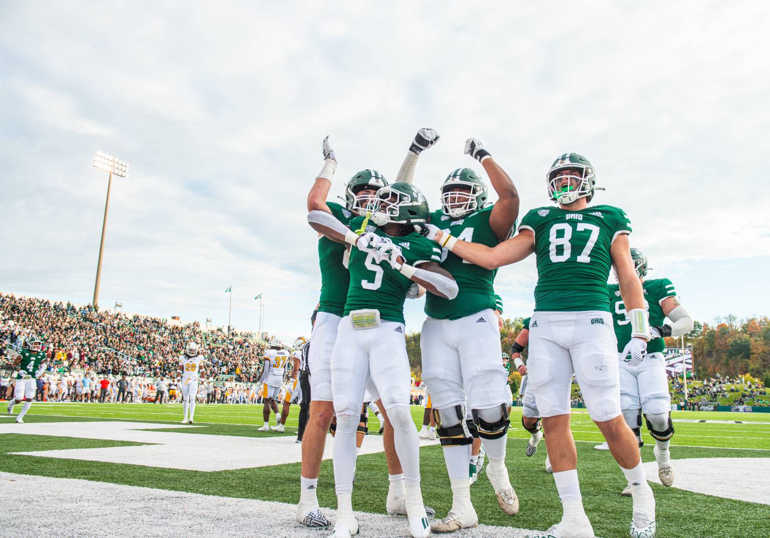 OHIO Football players celebrate at this year’s Homecoming Game.