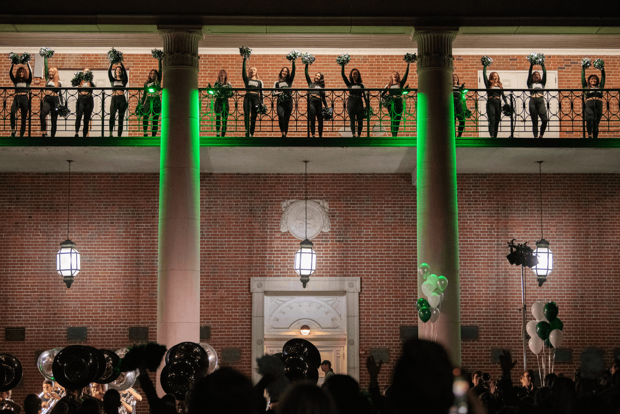 The Marching 110 and the Ohio University Cheerleading Team rally some Bobcat spirit ahead of Homecoming Weekend at the Yell Like Hell Pep Rally on College Green.