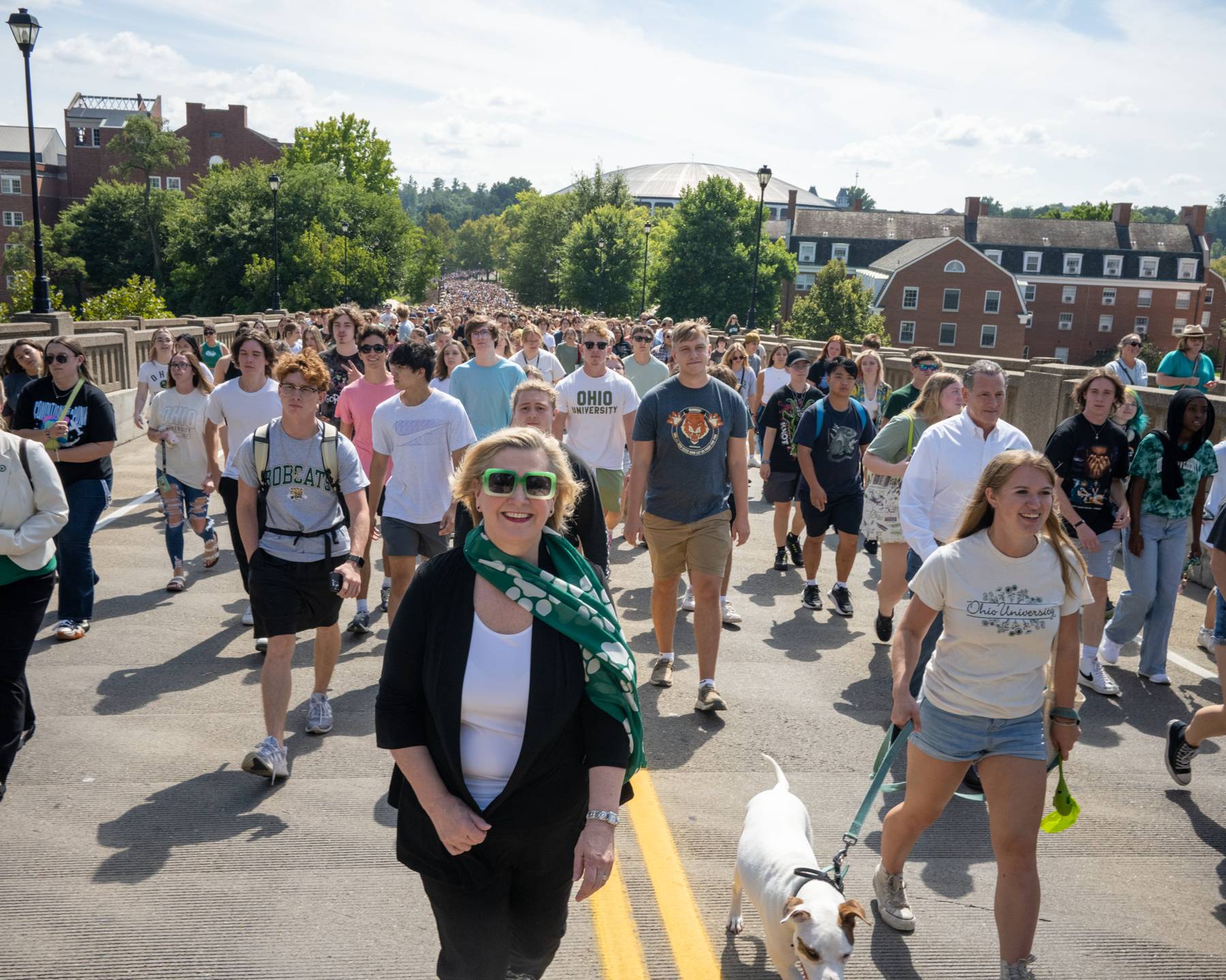 Ohio University President Lori Stewart Gonzalez leads students up Richland Avenue to the Student Organization Involvement Fair