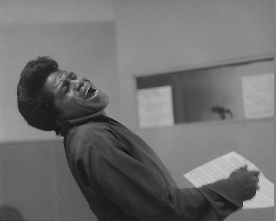 A 1966 black and white photo of James Brown taken by Chuck Stewart
