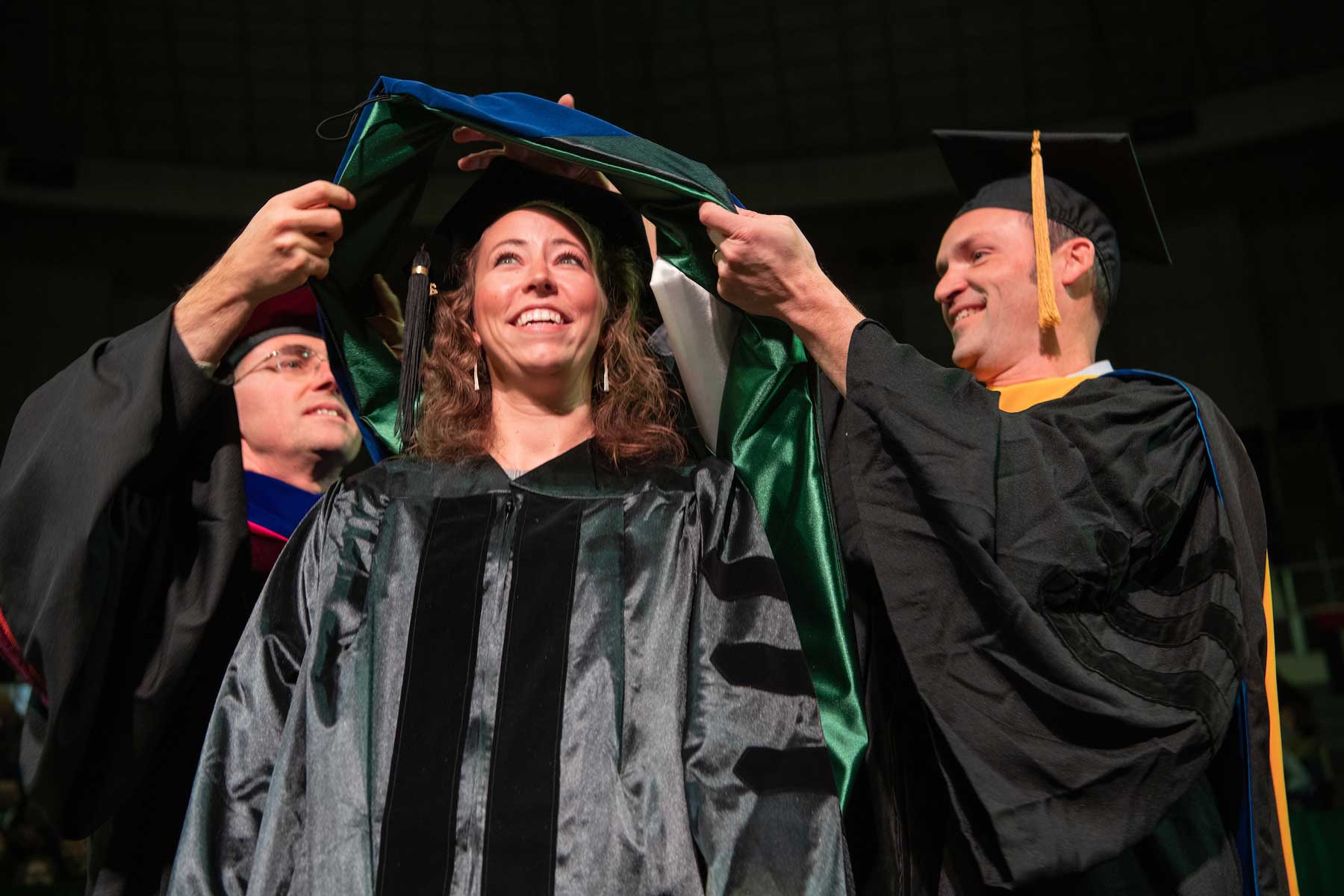Theresa Eagen gets a ceremonial hood during the 2019 Fall Commencement ceremony