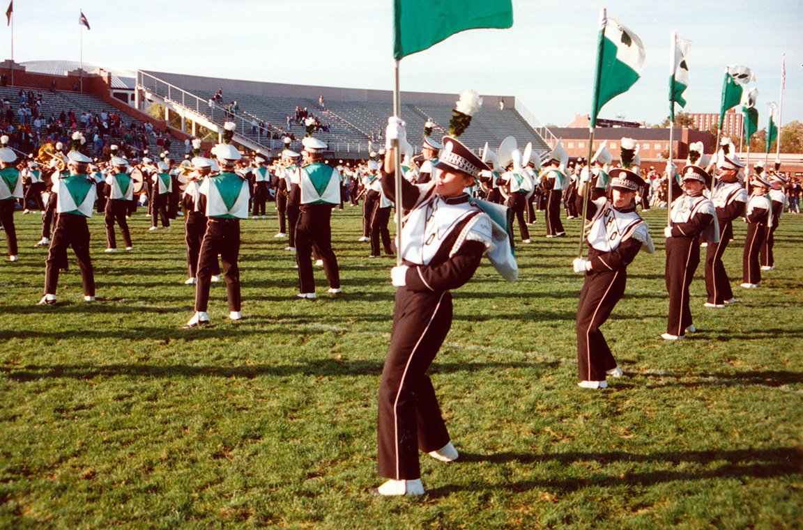 Vintage photo of the Marching 110 performing at an Ohio University Football game