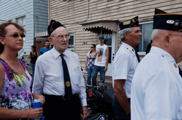 War veterans at a rally for fallen soldier