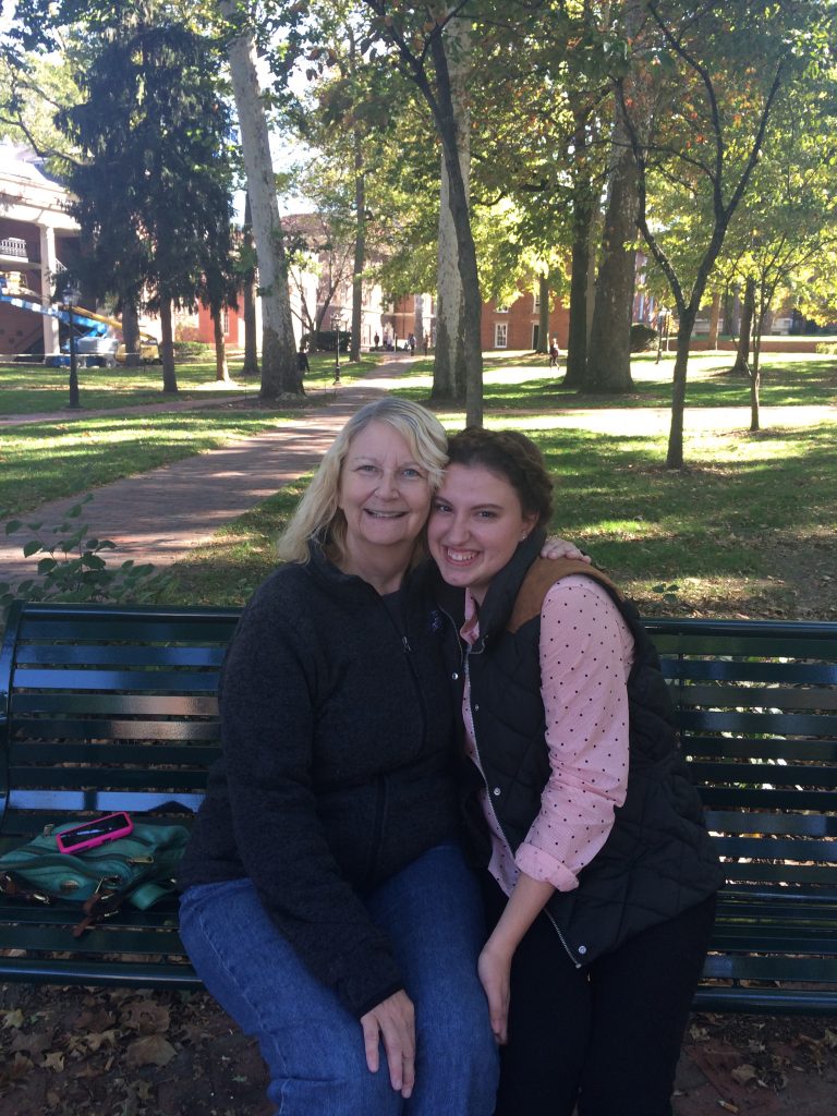 Anna and Kay Bekavac sit on College Green at Ohio University