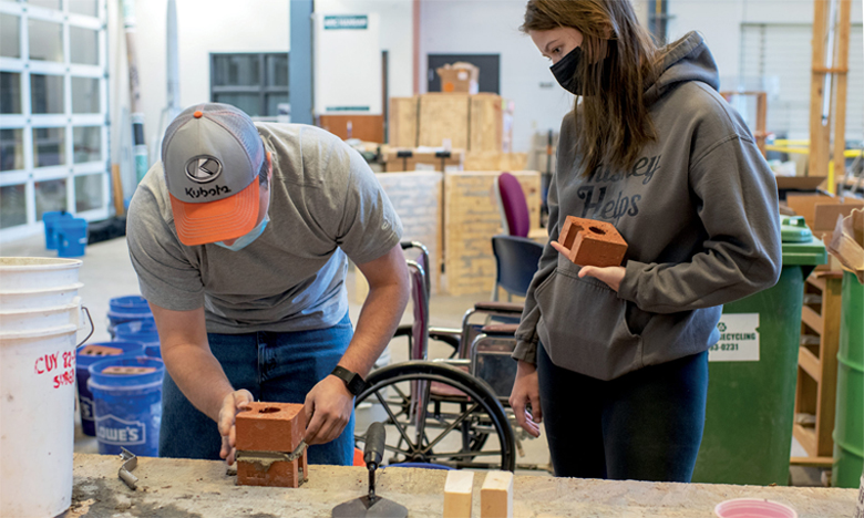 Among OHIO’s makerspaces is the Academic & Research Center Hangar, equipped with three glass garage doors, a floor hatch and an industrial crane. Russ College of Engineering and Technology students use the space for large senior design and team competition projects. Photo by Rich-Joseph Facun, BSVC ’01