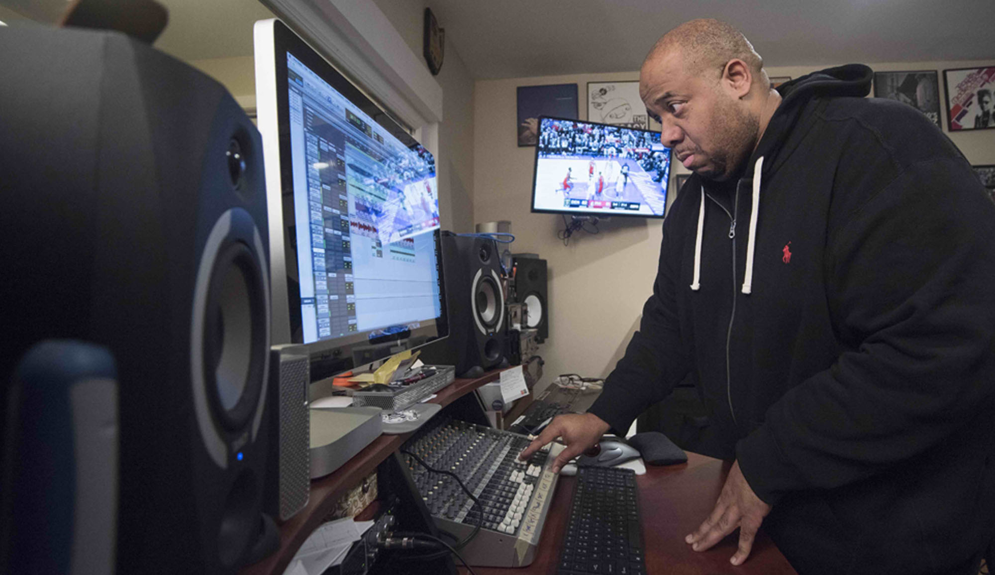 Dr. Jason Rawls, aka J. Rawls, mixes music in his studio in Pickerington, Ohio. Photo by Charles Ewing