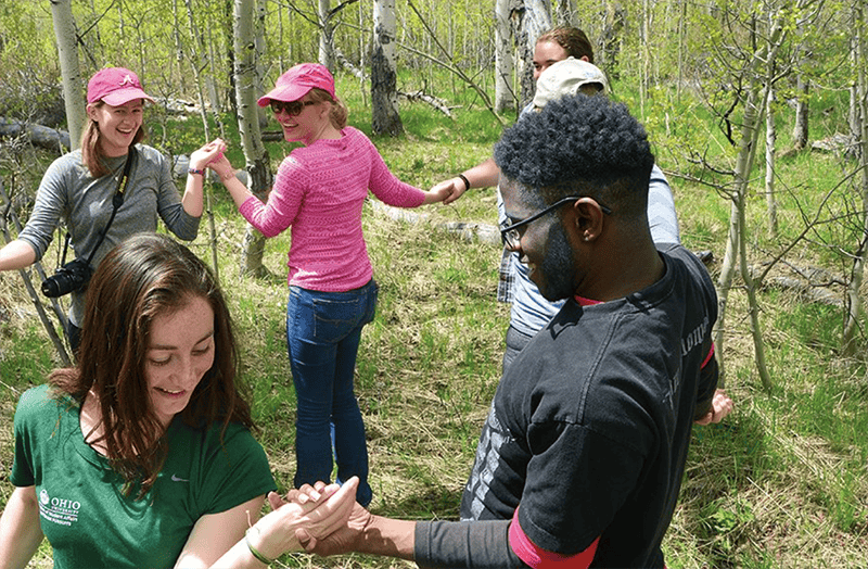 Students celebrate completing a 