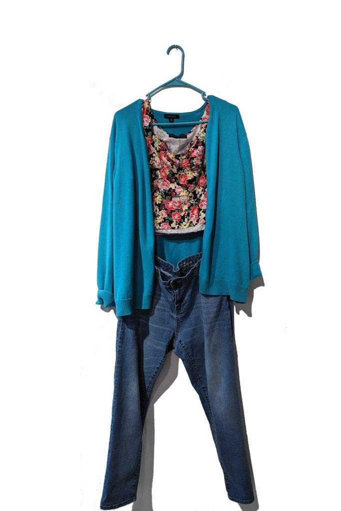 Floral crop top, blue cardigan sweater and jeans