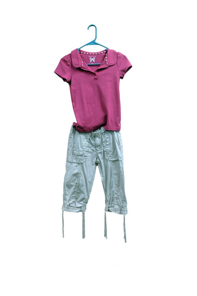 Pink polo shirt and capri pants