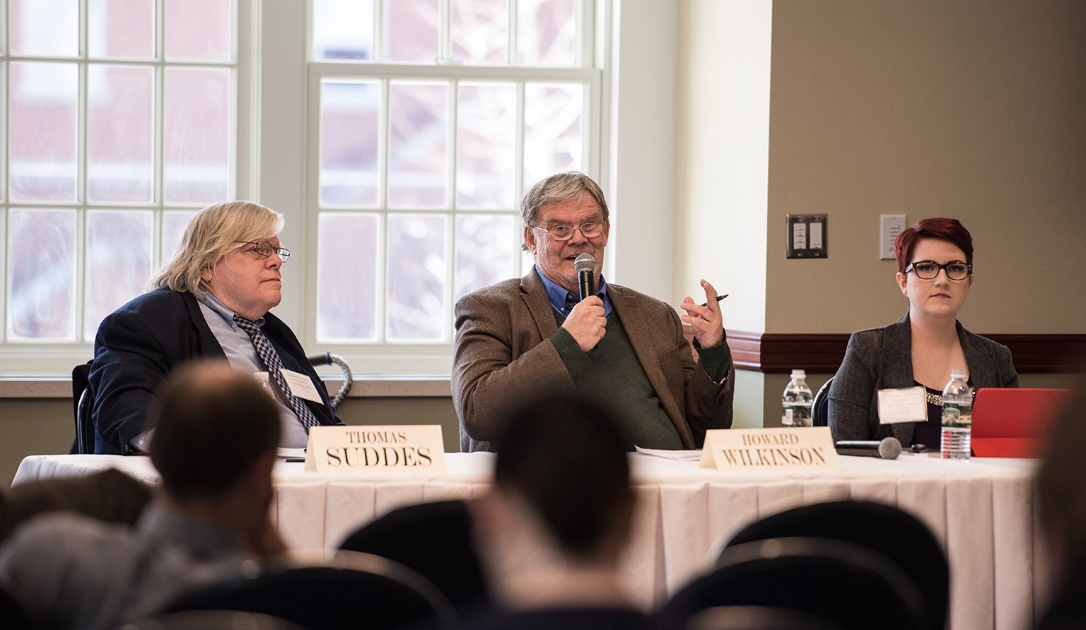 Thomas Suddes, MA '02, CERT, PHD '09; Howard Wilkinson; and Trista Thurston, BSJ '16, serve as panelists for the conference's topic, 