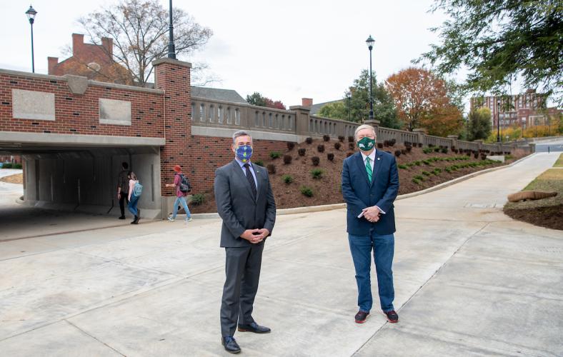 2 men standing outside infront of the newly built richland pedestrian tunnel