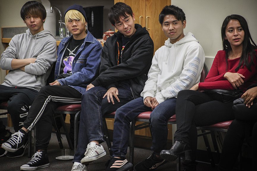 Students enrolled in the Ohio Program of Intensive English (OPIE) engage with the Athens community in December at the city’s public library.