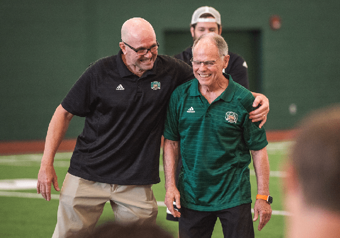 New Ohio University Head Football Coach Tim Albin is pictured with outgoing Head Coach Frank Solich.