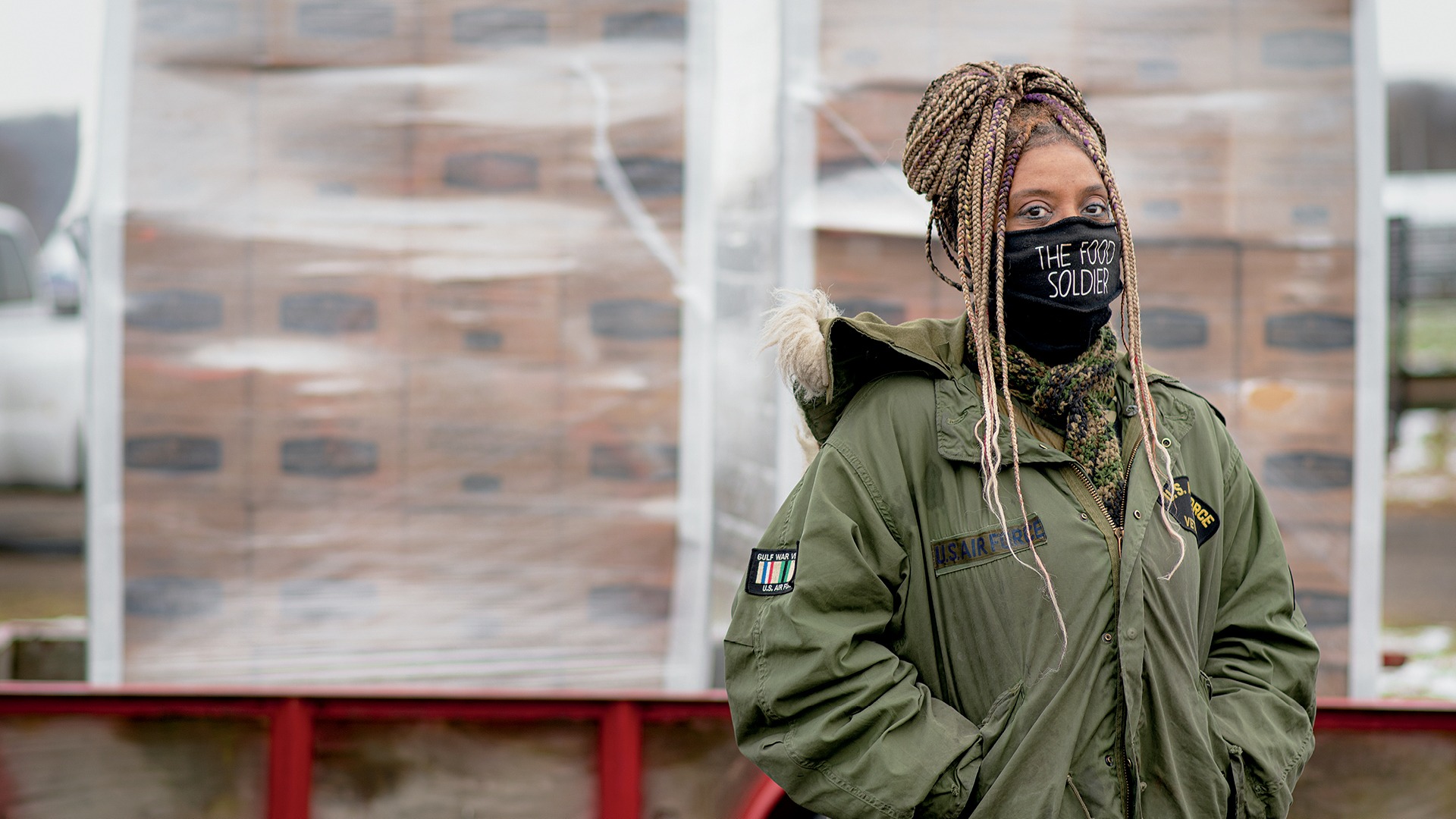 Woman standing in front of food bank 