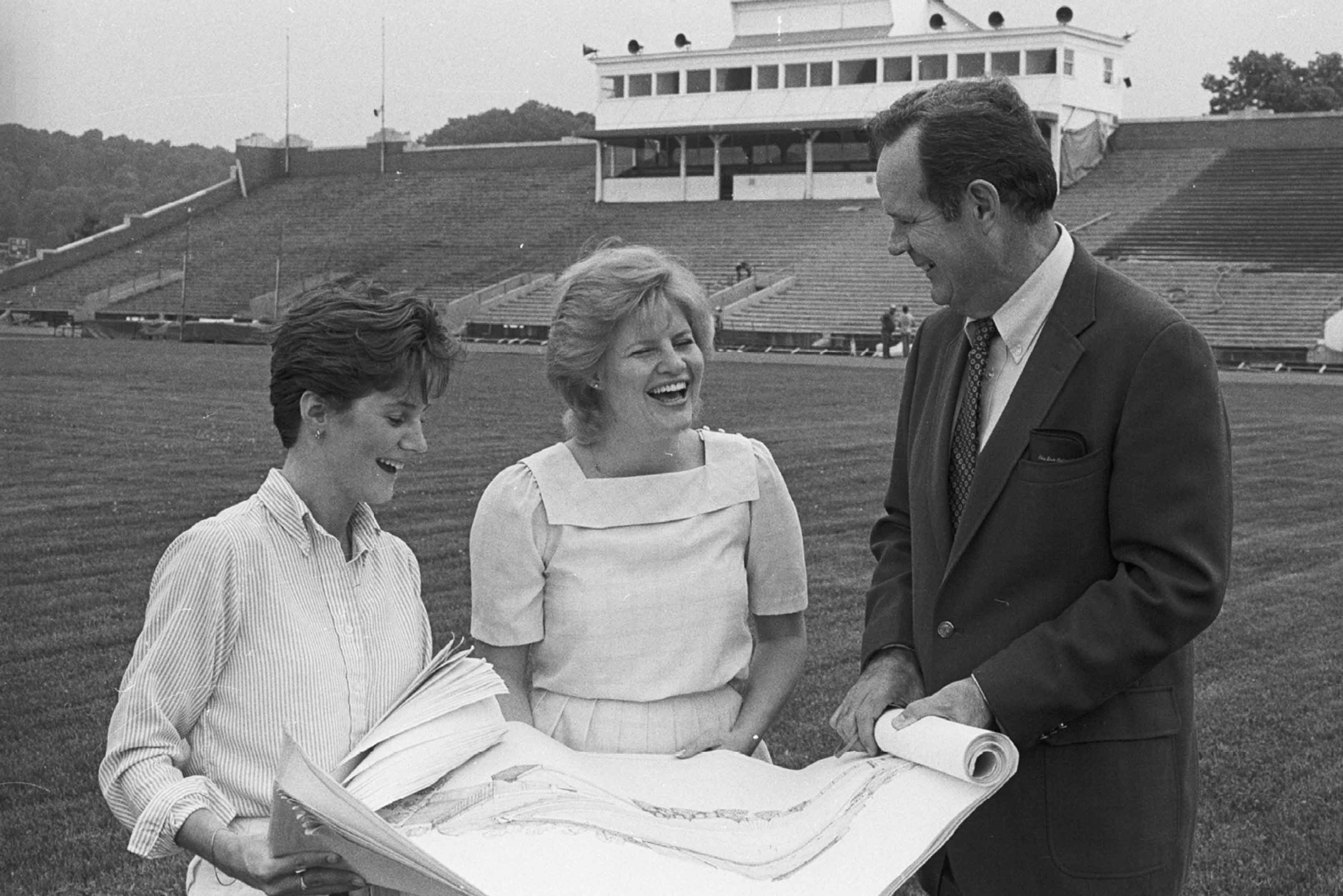 President Ping looks over architectural plans at Peden Stadium in this 1985 photo.