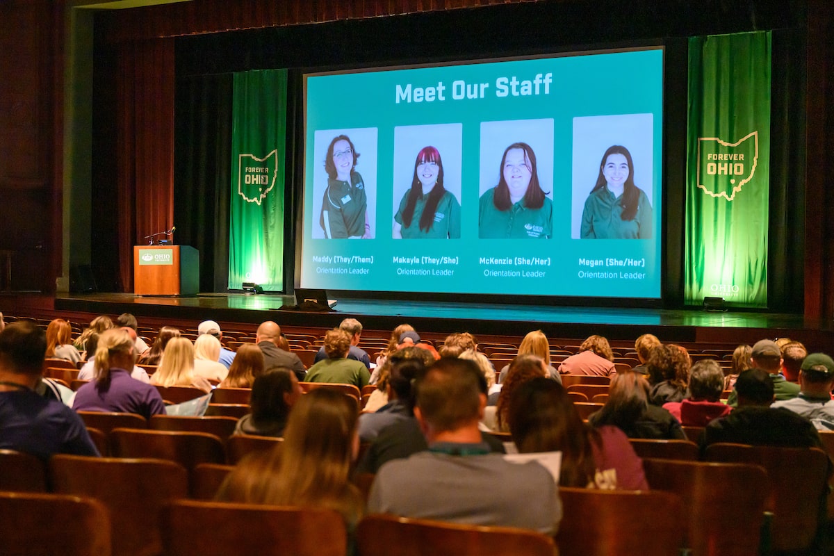 Incoming Ohio University students and parents watch a staff presentation at Bobcat Student Orientation