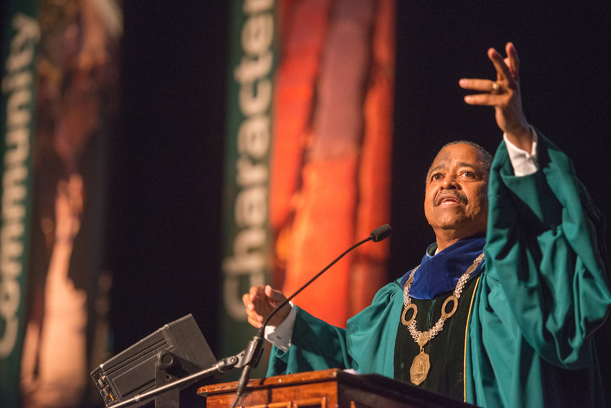 Roderick McDavis is shown speaking at the First Year Student Convocation event in 2013