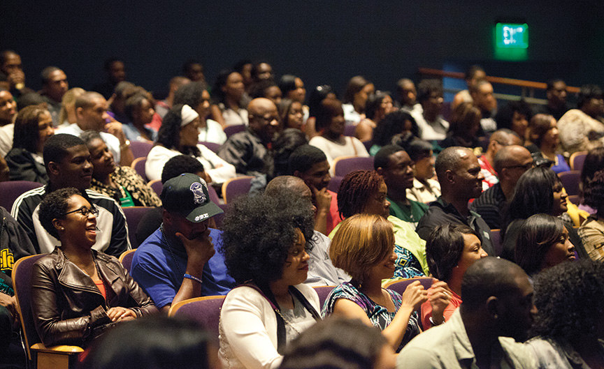 attendees of the 2013 Black Alumni Reunion are seated in Templeton-Blackburn Alumni Memorial Auditorium