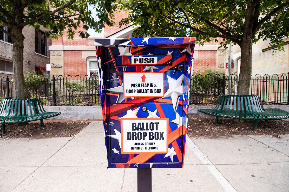 A ballot box decorated with red, white and blue 